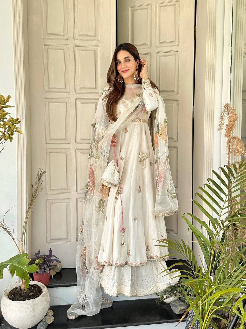 Luxury Ivory Crape Silk Anarkali Lehnga Set with Sheer Floral Dupatta and Potli