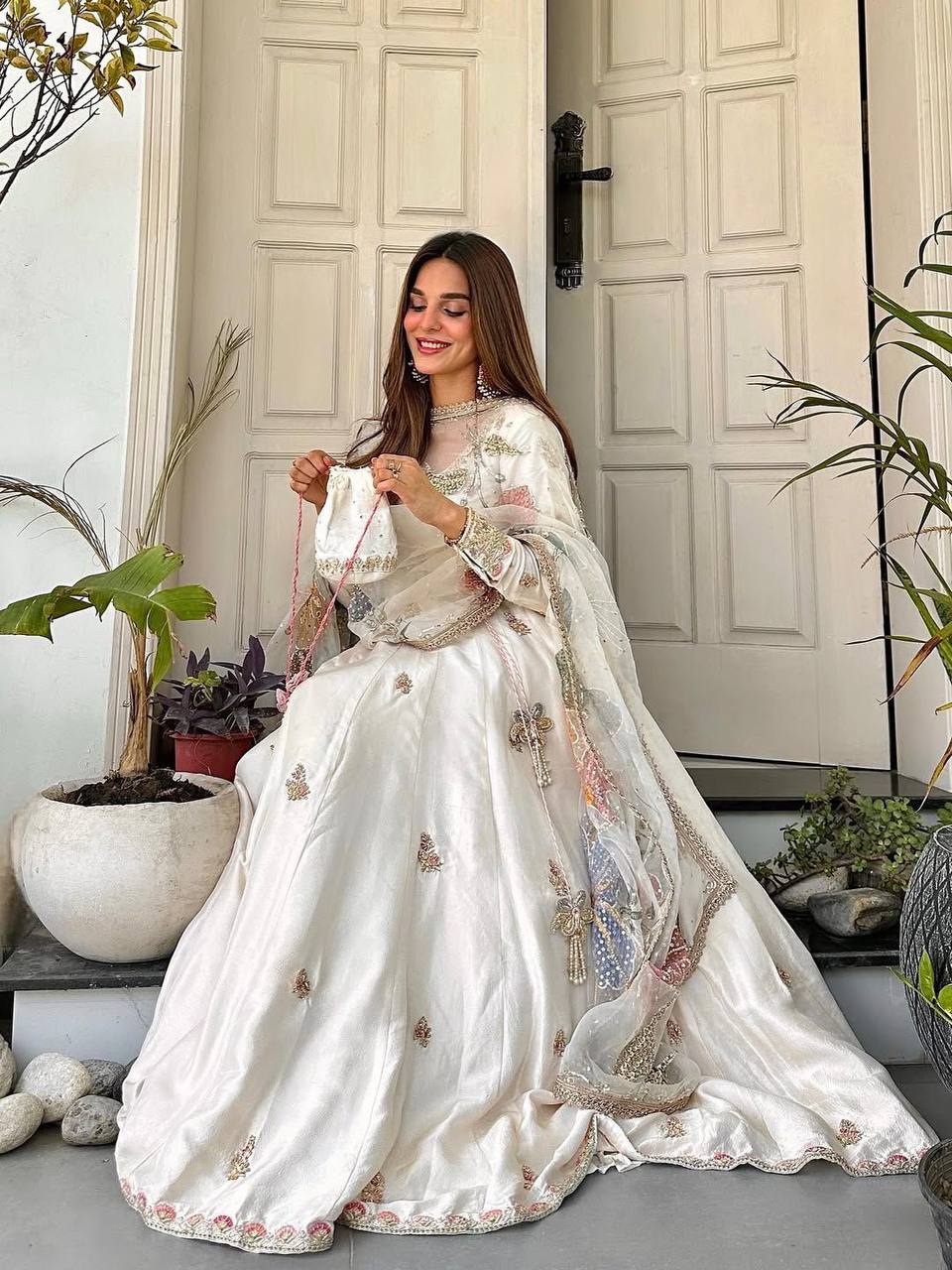 Luxury Ivory Crape Silk Anarkali Lehnga Set with Sheer Floral Dupatta and Potli
