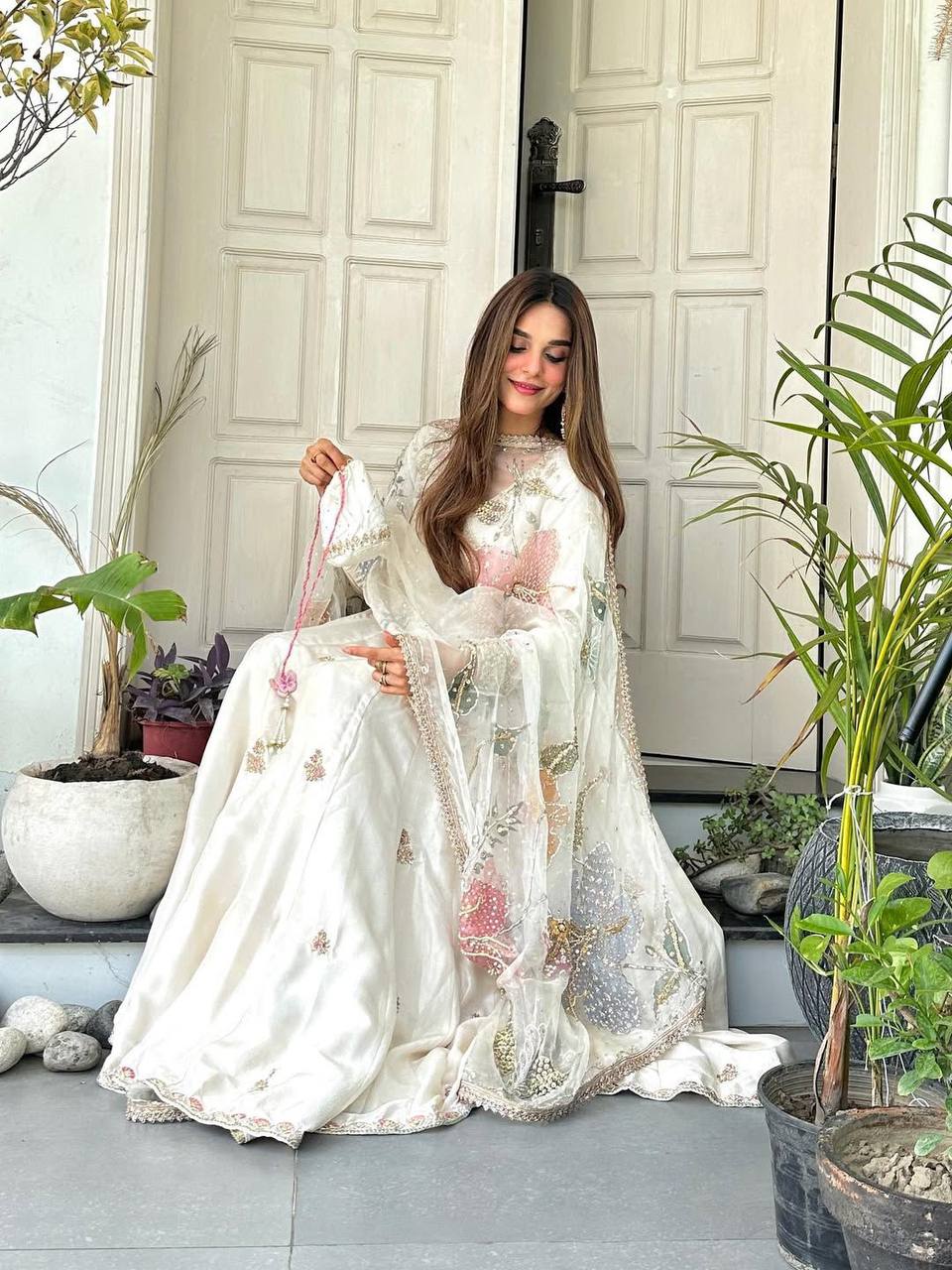 Luxury Ivory Crape Silk Anarkali Lehnga Set with Sheer Floral Dupatta and Potli